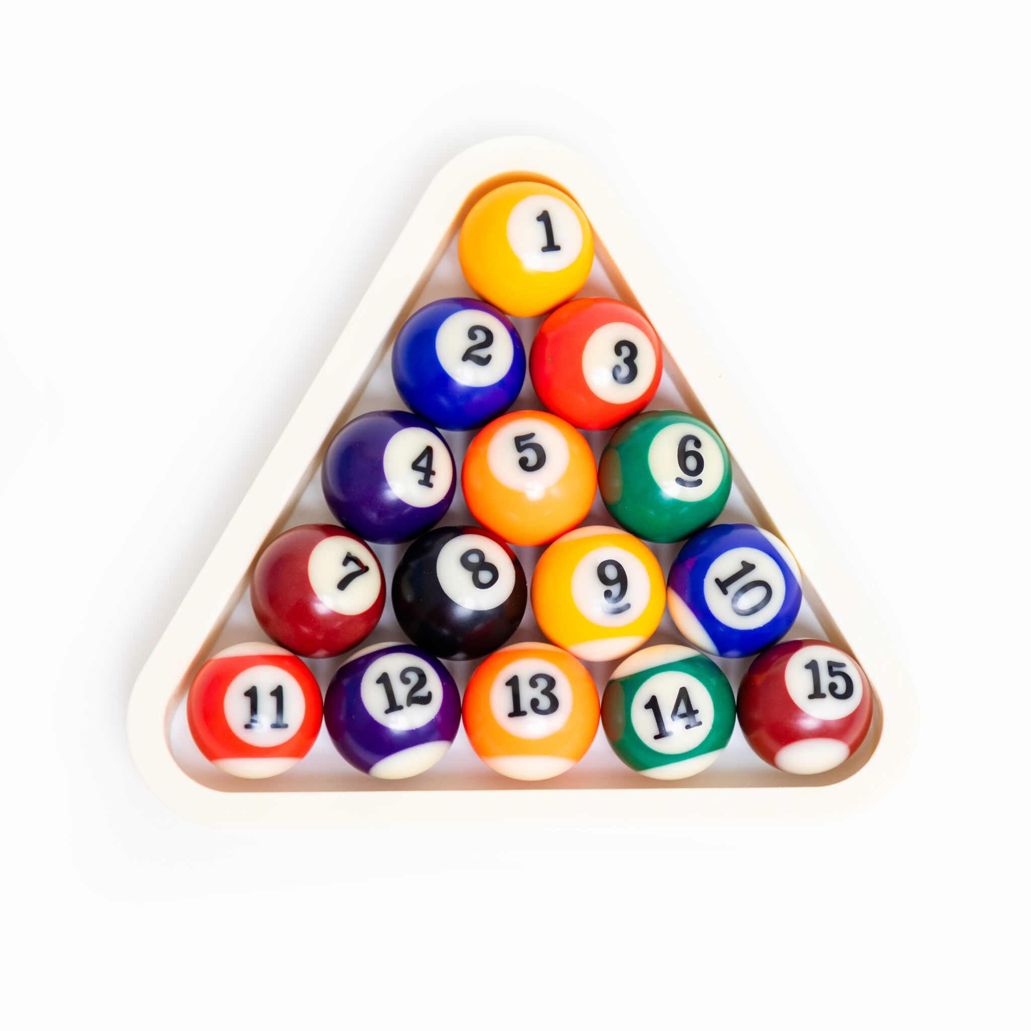 Billiard balls on a light background.